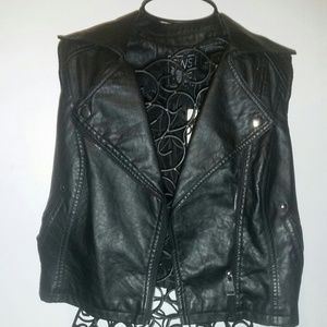 Black assymetrical vest